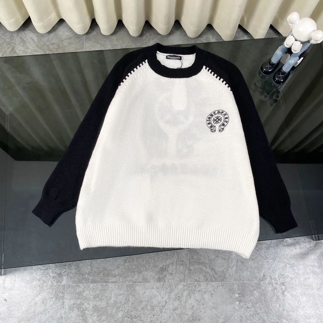 P260 ChromeHearts popular Chrome Hearts CH Sanskrit horseshoe cross embroidery pullover round neck raglan sleeve sweater. Contrast color splicing raglan round neck knitted sweater, unique knitting texture, soft and skin-friendly, classic pattern embroidery on the front and back. Retro chic. The contrasting color raglan sleeve design and the thick stitching craftsmanship at the joints make it look great when worn alone or layered! The fit is loose and slimming! Fashionable patchwork colored sweater, colorfully intertwined, with clear layers, warm and slimming. Whether worn alone or layered, you can easily control various styles and show your personal charm. The raglan sleeves are shoulder-width in contrasting colors and have ultra-detailed embroidery on the front and back, giving it a casual street feel. It looks great when worn alone! The sleeves are designed with contrasting colors and seams, and the round neck style reveals the neck and flatters the face shape! Wool blend knitted fabric, soft, comfortable and warm to the touch. Contrasting color design➕Loose fit, not flattering on your body shape and slimming, not to mention how easy it is to wear! Basic, versatile and fashionable classic! Black and white are versatile! Black and gray high-end! Couples get involved!  Color: black and white/black gray Size: S~M~L